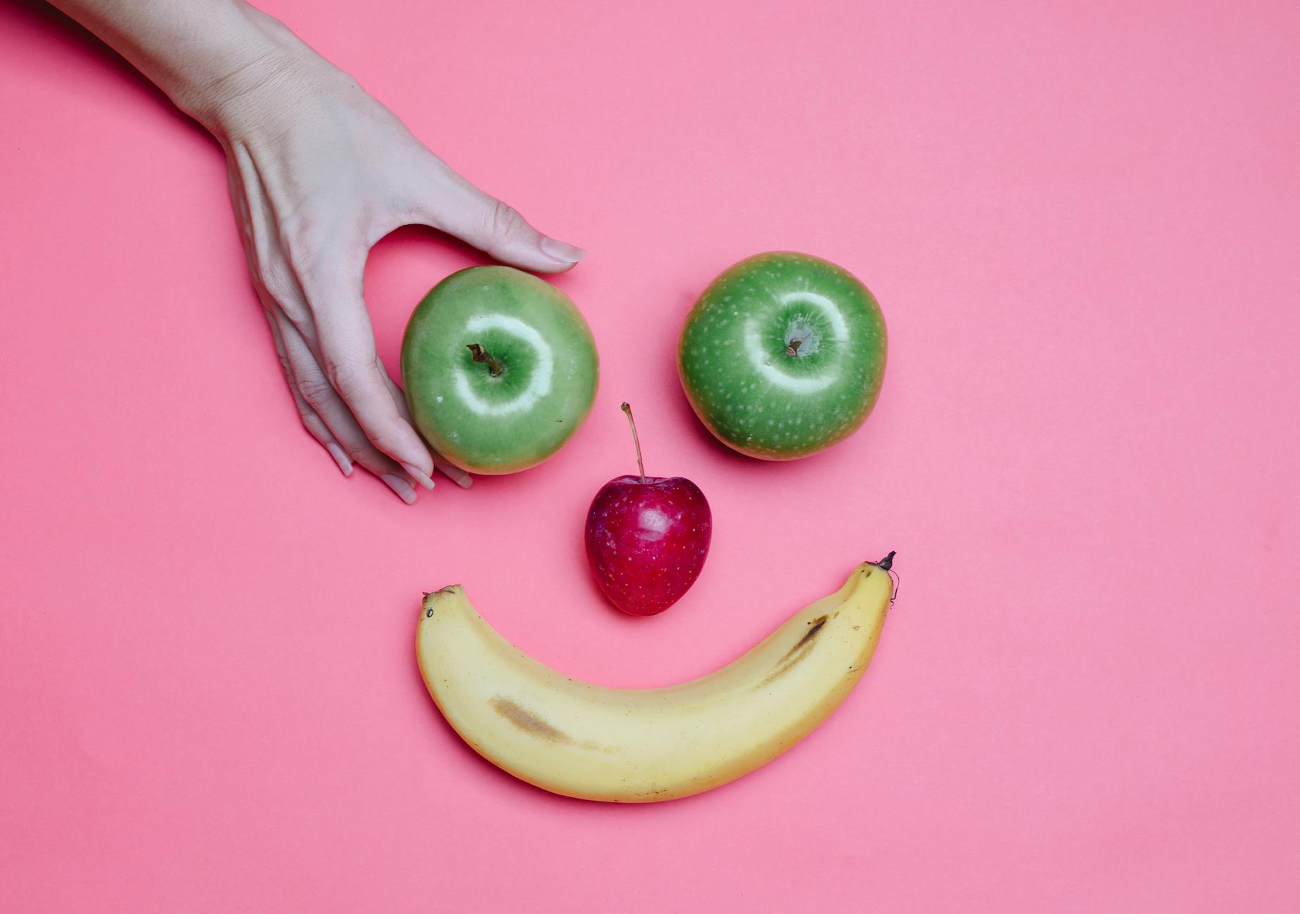 crop woman with different fruits